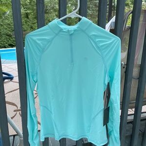 New Gfore women’s golf featherweight first layer in Fiji, small, rare! G/FORE